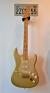 		Fender - STRATOCASTER 50 TH ANNIVERSARY 2004 AZTEK GOLD  
		