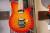 		Musicman - Axis Vibrato Floyd Rose HH Cherry Burst / MTHD
		