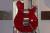 		Musicman - Axis Vibrato Floyd Rose HH Translucent Red 
		