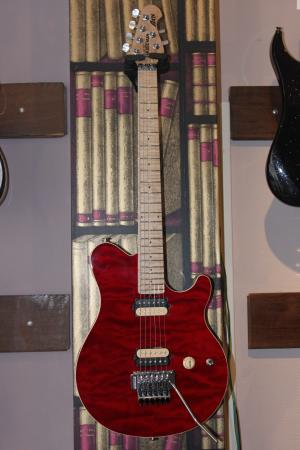 Musicman - Axis Vibrato Floyd Rose HH Translucent Red 
