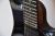 		Musicman - PETRUCCI BFR JP16 7 CORDES BLACK LAVA 
		